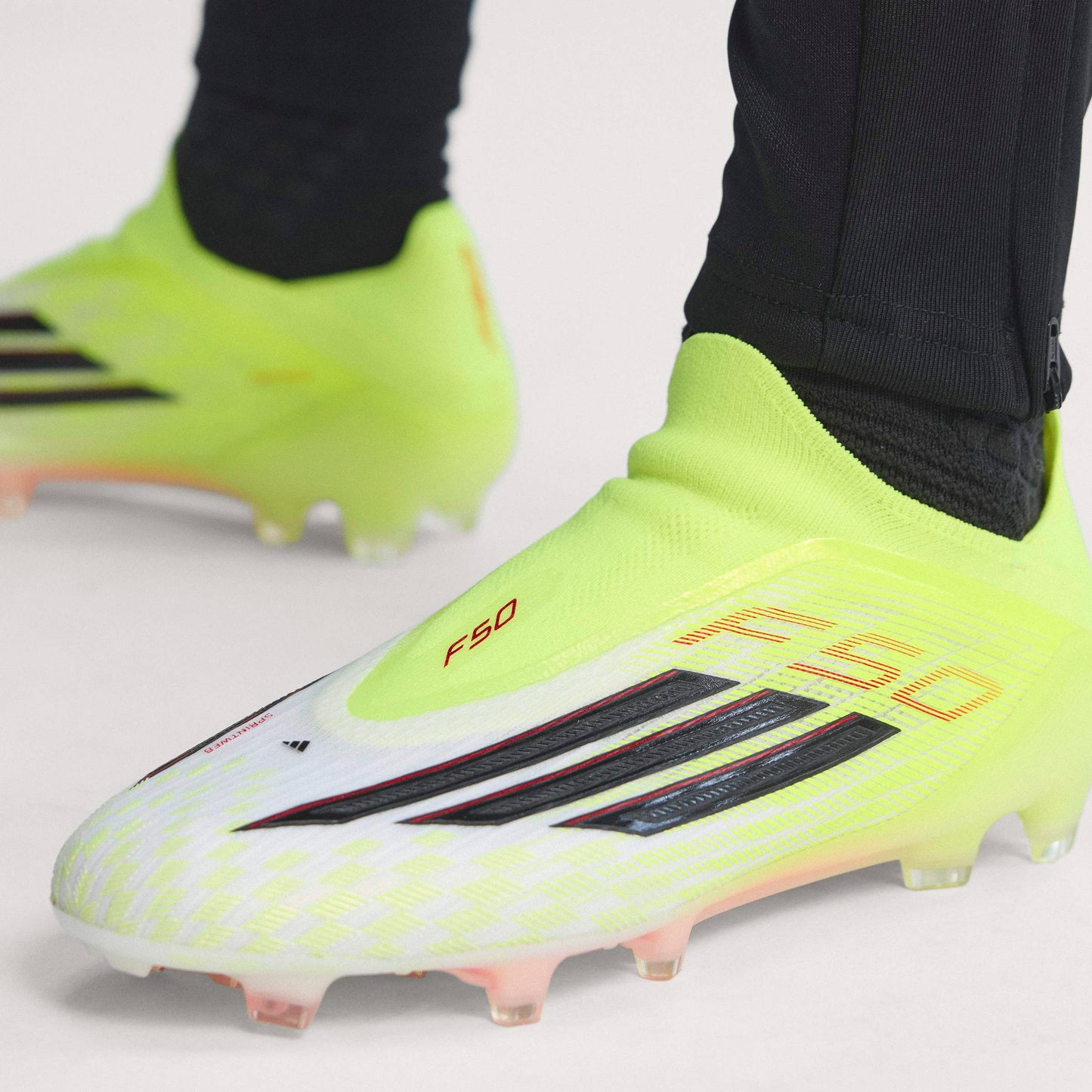 adidas F50 Elite Laceless FG Firm Ground Soccer Cleats - Tesoye /CBlack /Lucred